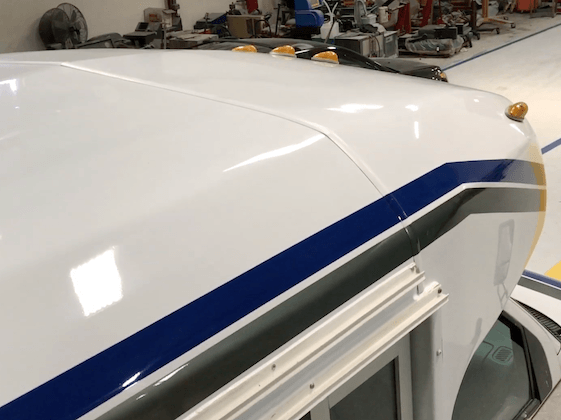 Heavy-duty bus roof being repaired at ATEL